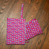 Set pareo con pochette fucsia